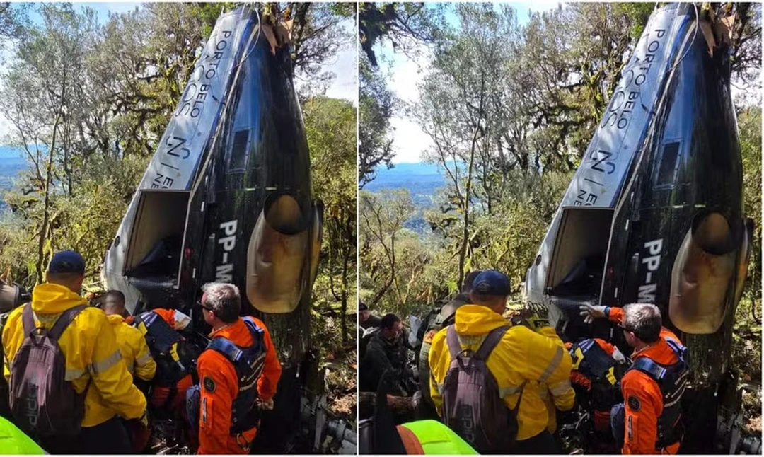 Helicóptero Bell 430 abatido na serra de Santa Catarina com destroços espalhados na mata