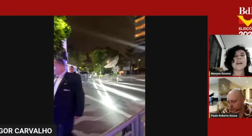 Carro da equipe de Flávio Bolsonaro isolado pelos agentes da Polícia Militar na TV Bandeirantes, Morumbi, São Paulo